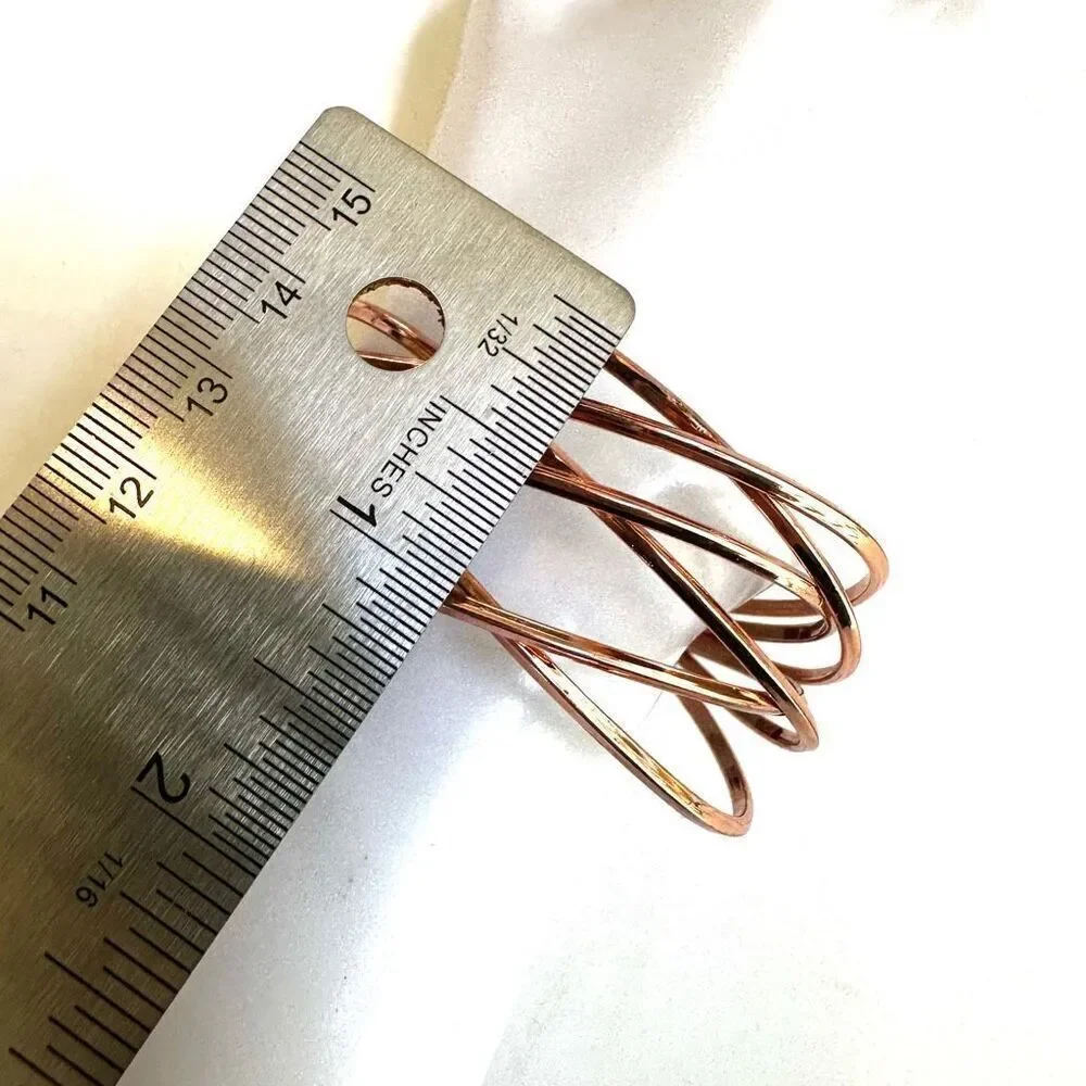Rose gold tone twisted open cuff bracelet